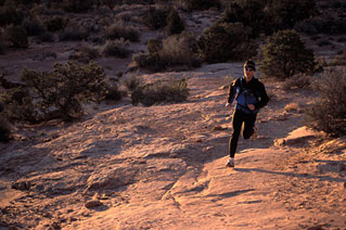 Chad Zummach on the primitive trail near the Windows. Arches National Park, Utah.